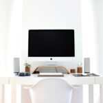 iMac on top of table